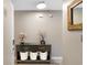 Hallway view of a console table, decor, and a mirror, offering a glimpse into the home's stylish interior at 210 Double Eagle Dr. # B-2, Surfside Beach, SC 29575
