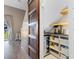 Charming pantry with custom shelving for organized storage, and a mini beverage refrigerator behind sliding barn door at 210 Double Eagle Dr. # B-2, Surfside Beach, SC 29575