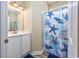 This bathroom features starfish decor and a single vanity sink with a shower/tub combo at 2405 Duffy St., North Myrtle Beach, SC 29582
