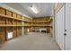 Spacious garage with built-in shelving offering ample storage and organization at 2405 Duffy St., North Myrtle Beach, SC 29582