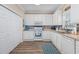 Bright, well-equipped kitchen with white cabinets, stainless steel appliances, and modern backsplash at 2405 Duffy St., North Myrtle Beach, SC 29582