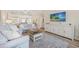 Comfortable living room featuring beachy decor, a large TV, and an open layout at 2405 Duffy St., North Myrtle Beach, SC 29582