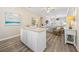 Open living area with island, seamless flow, and modern decor, creating an inviting atmosphere at 2405 Duffy St., North Myrtle Beach, SC 29582