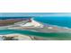 Stunning aerial of turquoise waters meet white sand beaches, highlighting coastal living at 251 Egret Run Ln. # 1122, Pawleys Island, SC 29585
