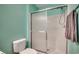 Bathroom features glass shower, toilet, and a towel rack with a towel hanging at 251 Egret Run Ln. # 1122, Pawleys Island, SC 29585