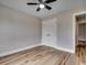 Bedroom featuring wood flooring and a closet with double doors at 2599 Woodcreek Ln., Conway, SC 29527