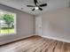Bedroom with a ceiling fan and wood flooring at 2599 Woodcreek Ln., Conway, SC 29527