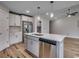 Island kitchen featuring stainless steel appliances and modern lighting at 2599 Woodcreek Ln., Conway, SC 29527