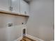Laundry room with white cabinets, utility hookups, and access for appliances at 2599 Woodcreek Ln., Conway, SC 29527