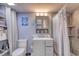 This bathroom features a shower, storage, toilet, and vanity at 2801 S Ocean Blvd. # 538, North Myrtle Beach, SC 29582