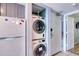Convenient laundry area featuring a stacked washer and dryer for space-saving efficiency at 2801 S Ocean Blvd. # 538, North Myrtle Beach, SC 29582