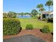 Scenic view of the community with a lake, lush landscaping, and access to pool at 281 Palmetto Glen Dr., Myrtle Beach, SC 29588