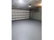 Garage features epoxy flooring, garage door, and an automatic door opener at 281 Palmetto Glen Dr., Myrtle Beach, SC 29588
