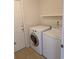 Laundry room features a door to the exterior, washer and dryer at 281 Palmetto Glen Dr., Myrtle Beach, SC 29588