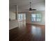 Spacious living room with a ceiling fan and large window, filled with natural light at 281 Palmetto Glen Dr., Myrtle Beach, SC 29588
