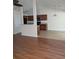 Open-concept living area with bar counter, and a view into the kitchen with dark wood cabinets at 281 Palmetto Glen Dr., Myrtle Beach, SC 29588