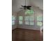 Bright room with vaulted ceiling and large windows offering lovely views of the backyard at 281 Palmetto Glen Dr., Myrtle Beach, SC 29588