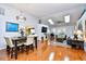 Open-concept living space with hardwood floors, vaulted ceilings, and abundant natural light at 3105 Robyn Ct., Little River, SC 29566