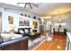 Spacious living room featuring hardwood floors, modern decor, and a comfortable seating area at 3105 Robyn Ct., Little River, SC 29566