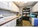Bright and spacious office featuring built-in cabinets and a desk at 3105 Robyn Ct., Little River, SC 29566