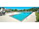 Community pool surrounded by lounge chairs and umbrellas for relaxation at 3105 Robyn Ct., Little River, SC 29566