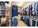 Well-organized walk-in closet features ample storage with shelves and hanging rods for clothes and shoes at 3105 Robyn Ct., Little River, SC 29566