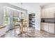 Charming breakfast nook with a bay window, pantry, and barstool seating at 364 Palm Lakes Blvd., Little River, SC 29566
