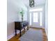 Welcoming entryway featuring an accent table, a decorative vase, and natural light at 3718 Highway 931, Conway, SC 29526