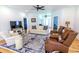Cozy living room with hardwood floors, comfortable seating, and ample natural light at 3718 Highway 931, Conway, SC 29526