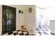 Mud room with black and white tile floors and a laundry room at 3718 Highway 931, Conway, SC 29526