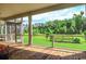 Spacious screened-in porch with wooded view, perfect for enjoying the outdoors without the bugs at 3718 Highway 931, Conway, SC 29526