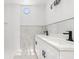Modern bathroom features double sinks, sleek fixtures and a tiled shower at 401 S Nichols St., Nichols, SC 29581