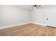 Spacious bedroom features light wood flooring and a modern ceiling fan at 401 S Nichols St., Nichols, SC 29581