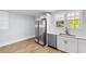 Well-lit kitchen featuring stainless steel appliances and ample cabinet space at 401 S Nichols St., Nichols, SC 29581