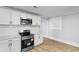 Modern kitchen with stainless steel appliances and subway tile backsplash at 401 S Nichols St., Nichols, SC 29581