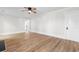 Bright living room featuring new floors, fresh paint, and a ceiling fan at 401 S Nichols St., Nichols, SC 29581
