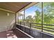 Screened balcony with views of lush greenery, offering a private outdoor space at 415 Ocean Creek Dr. # 2388, Myrtle Beach, SC 29572