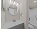 Bright bathroom with gray cabinets, modern lighting, and a walk-in shower at 415 Ocean Creek Dr. # 2388, Myrtle Beach, SC 29572