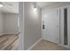 Entryway featuring tile flooring, neutral paint and a closed white door at 415 Ocean Creek Dr. # 2388, Myrtle Beach, SC 29572
