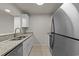 Modern kitchen featuring stainless steel appliances and granite countertops at 415 Ocean Creek Dr. # 2388, Myrtle Beach, SC 29572