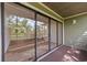 Covered patio features sliding glass doors offering seamless indoor-outdoor living at 415 Ocean Creek Dr. # 2388, Myrtle Beach, SC 29572