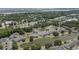 Aerial view of the community featuring ponds, mature trees, tennis courts, a pool and well-maintained landscaping at 4280 Santolina Way # C, Murrells Inlet, SC 29576