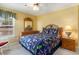 Bright bedroom featuring a large window, comfortable queen bed, and tasteful wooden furnishings at 4280 Santolina Way # C, Murrells Inlet, SC 29576