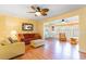 Cozy living room with wood floors and ceiling fans, perfect for relaxing and entertaining at 4280 Santolina Way # C, Murrells Inlet, SC 29576