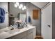 Bathroom showcasing double sinks with vanity, mirrored cabinet, and decorative touches at 4486 Little River Inn Ln. # 2106, Little River, SC 29566
