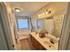 Bright bathroom featuring a double sink vanity, soaking tub, and modern fixtures at 45 Woodhaven Dr. # D, Murrells Inlet, SC 29576
