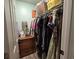 Walk-in closet featuring custom shelving and ample storage for clothes and accessories at 45 Woodhaven Dr. # D, Murrells Inlet, SC 29576