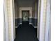 Clean hallway, painted in neutral colors with carpeting at 45 Woodhaven Dr. # D, Murrells Inlet, SC 29576