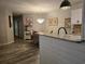 Stylish kitchen flows to a dining area featuring modern appliances and elegant decor at 45 Woodhaven Dr. # D, Murrells Inlet, SC 29576