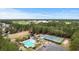 Aerial view of the pool, playground, parking, tennis, and golf course at 4826 Keel Ct., Myrtle Beach, SC 29579